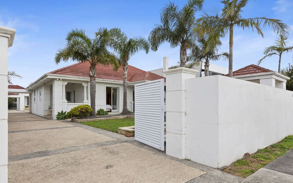 Driveway with secure gates and fully fenced