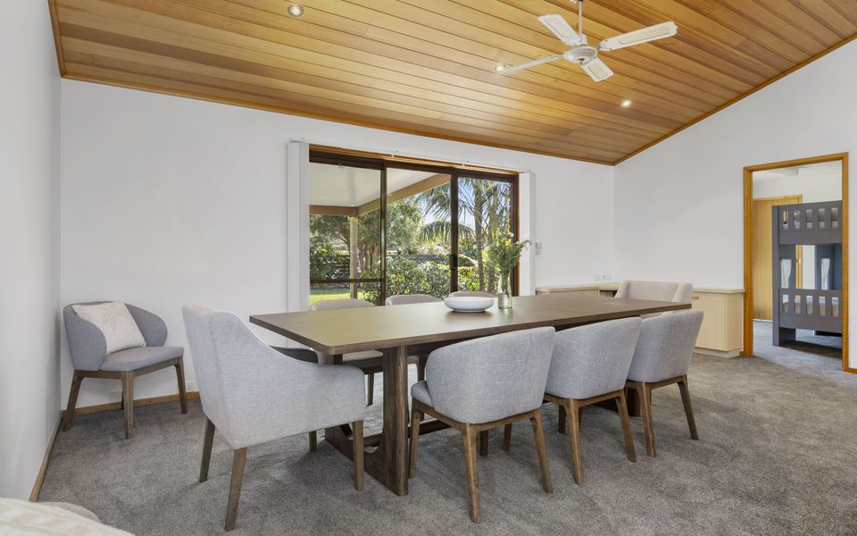 Dining room with access to the alfresco area via sliding doors.
