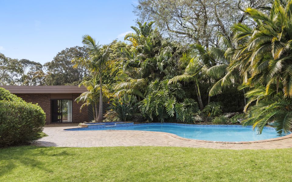 Enjoy the heated pool and spa, fully fenced and accessible from the kitchen and billiard room