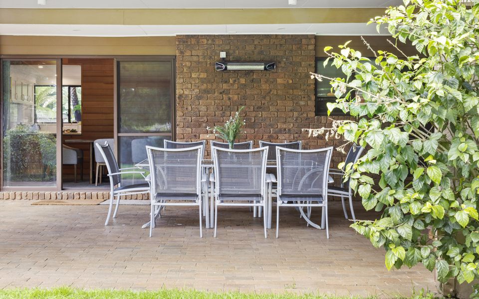 Alfresco dining with BBQ overlooking the private garden.