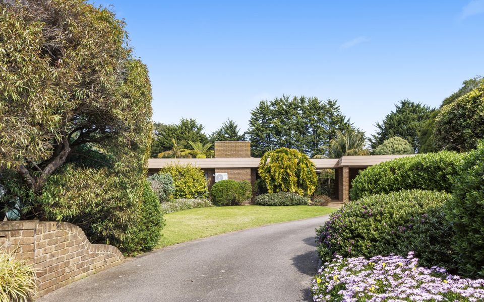 Long driveway with plenty of parking as well as an undercover carport for two cars.