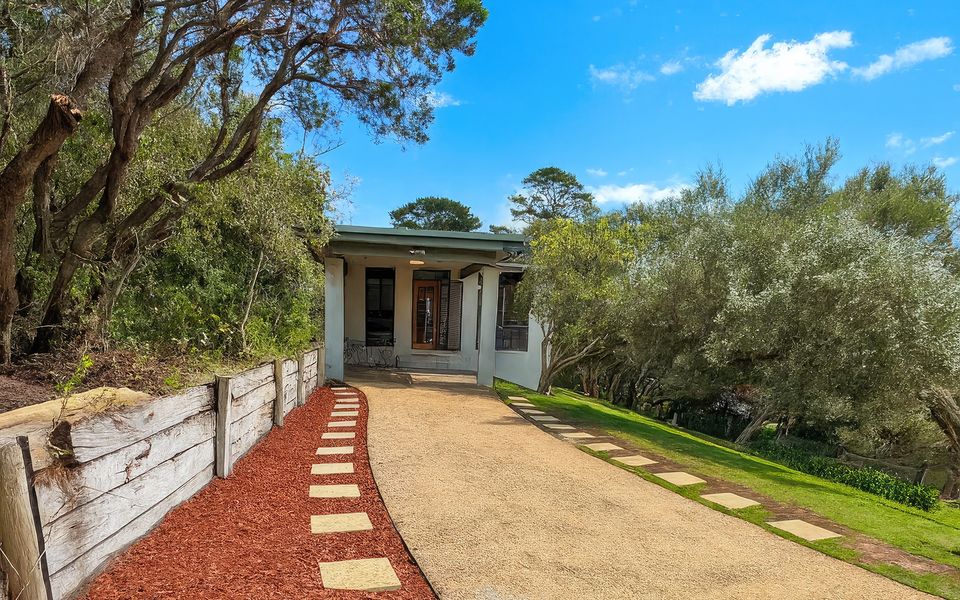 Undercover parking for one car and plenty of room for two more in the driveway.