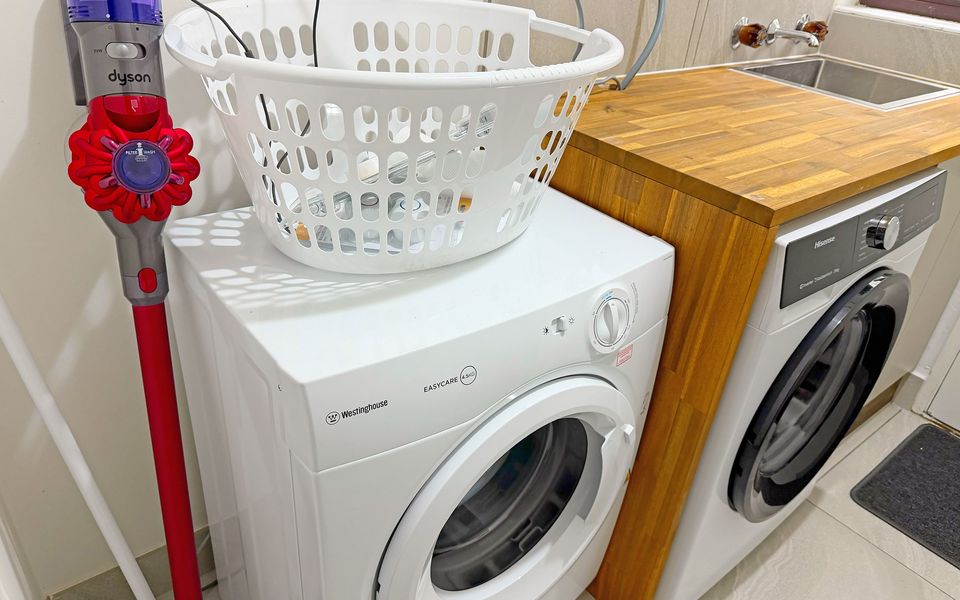 Laundry equipped with a washing machine and dryer