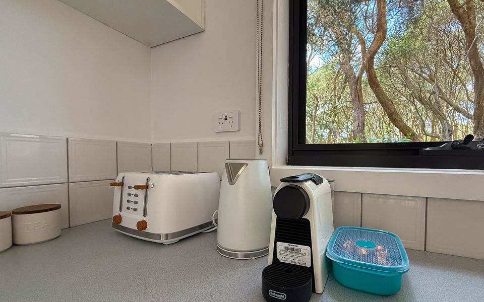 Brew a morning coffee and relax under the moonah trees.