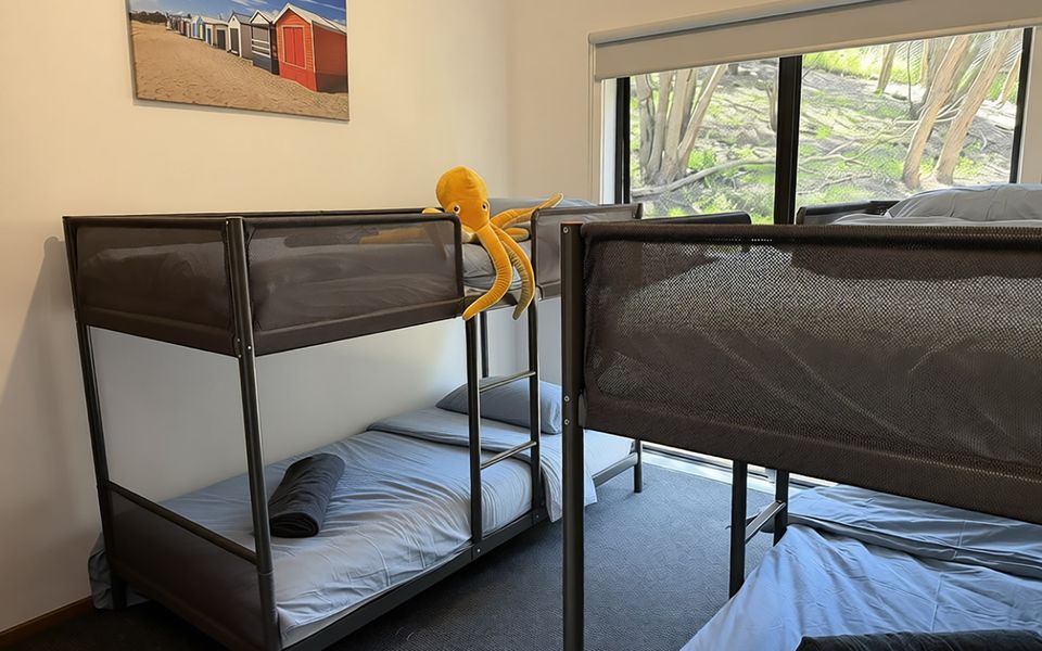 Bedroom three with two single bunk beds, all bedding and towels are provided