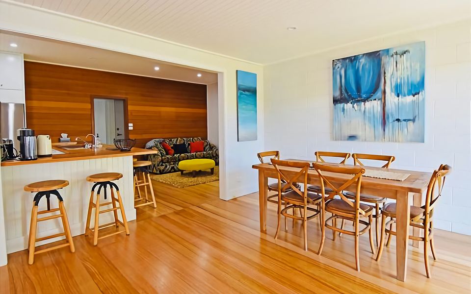Dining area off main living area has seating for 6 people.