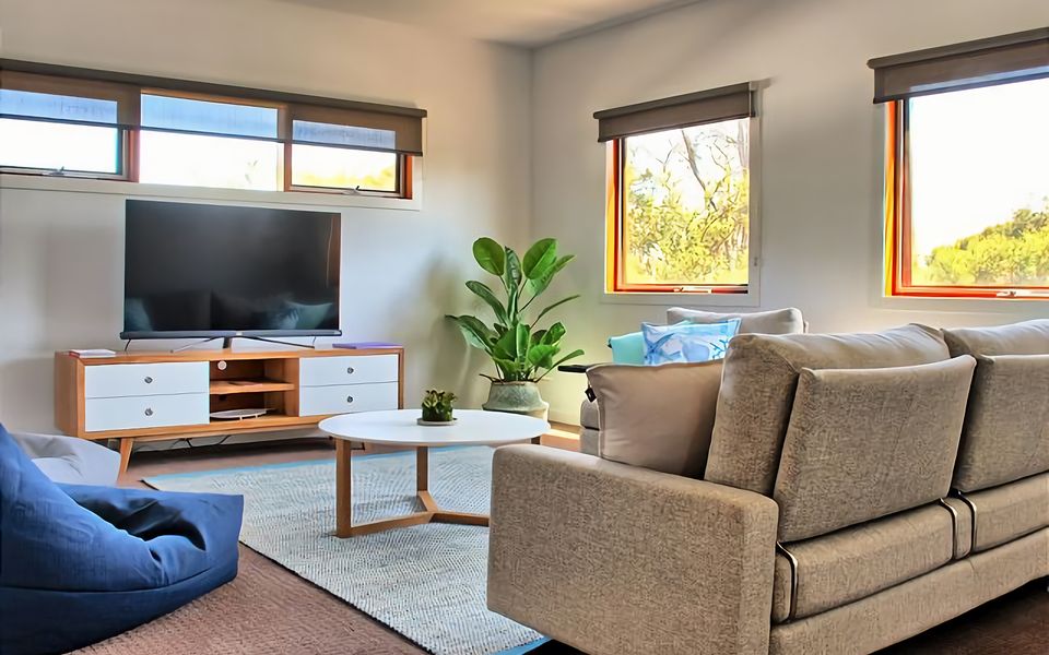 Cinema room with loads of comfy seating and large flatscreen TV with Netflix.