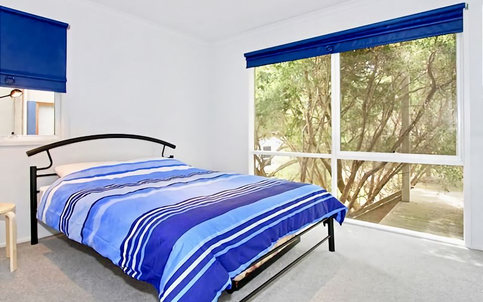 Sleep comfortably in bedroom that has a Queen Bed.