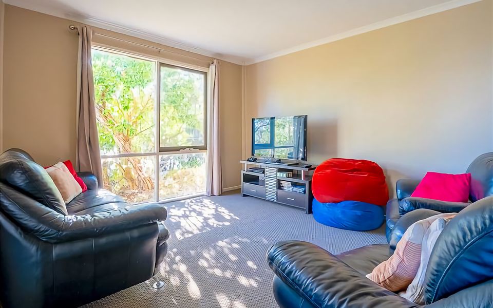 Rumpus room with loads of comfy seating and games.