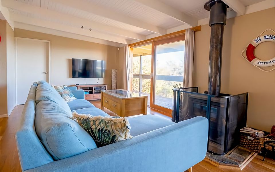 Enjoy comfort with the plush couches and enjoy the wood fire heater.