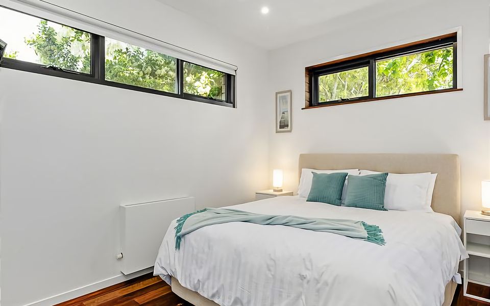 Plush King bed bedroom.