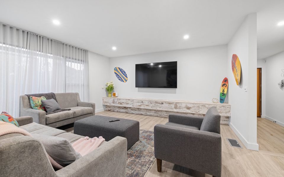 Family room with TV and kids area
