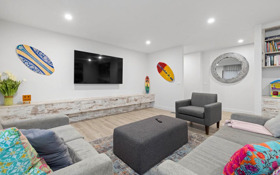 Family room with TV and kids area
