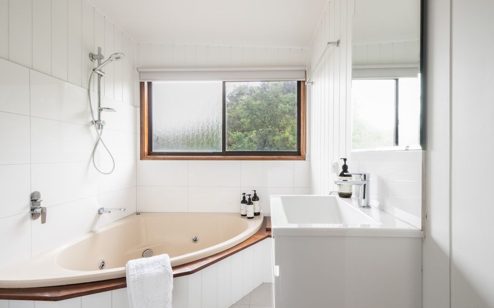 Master Ensuite with spa bath, shower, toilet and basin.