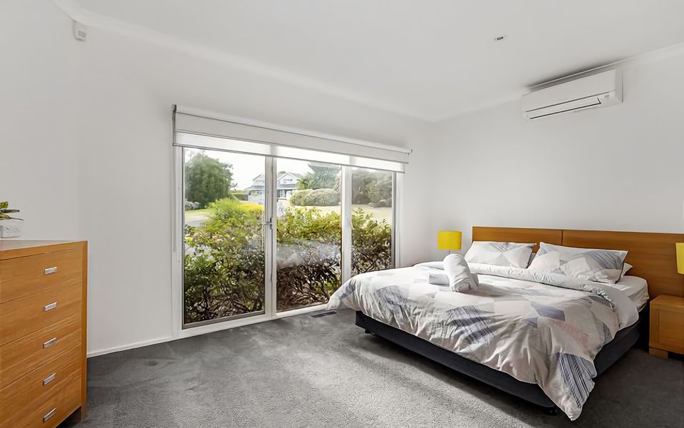 Queen Bedroom with air conditioning.