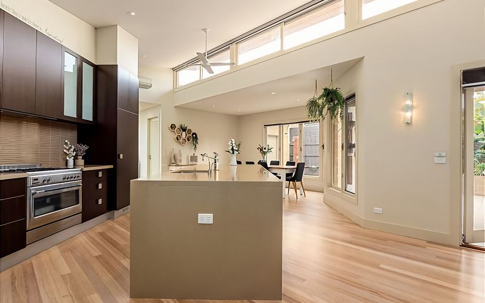 The modern kitchen is a complete delight to prepare meals equipped with everything you need.