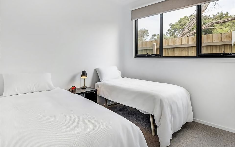 Room boasts a single bed and trundle, accommodating friends and family on your vacation.