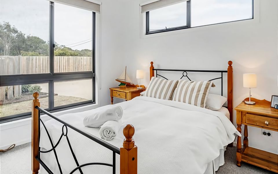 Enjoy a peaceful night's sleep on our plush queen bed.