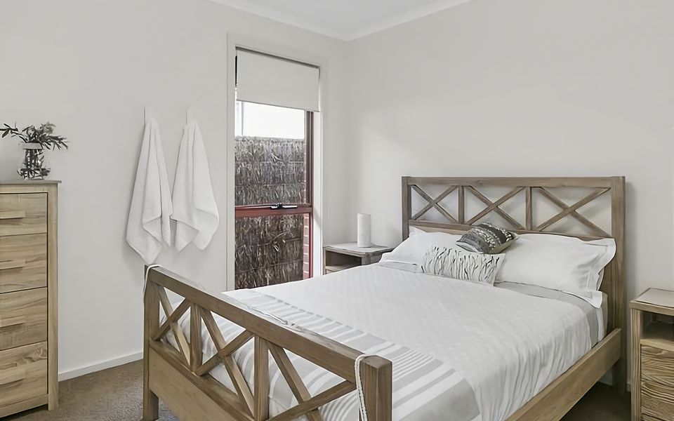 Enjoy a peaceful night's sleep on our plush queen bed.