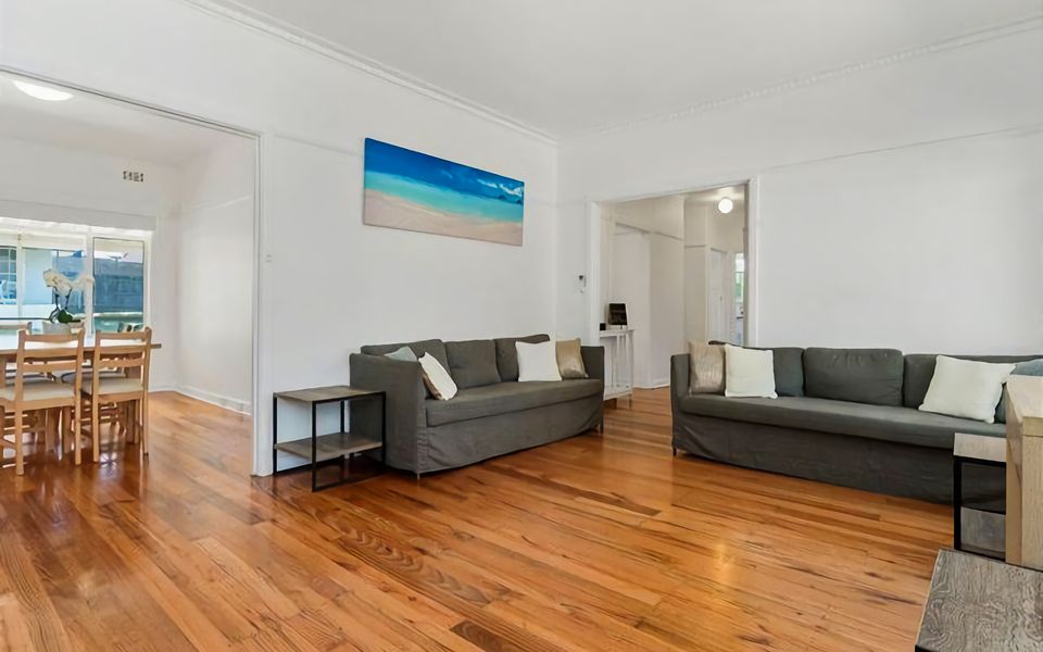 Large living room complete with big screen TV, DVD player, Wi-Fi, split system AC, and two couches which can easily fold out to sleep 4 extra guests.