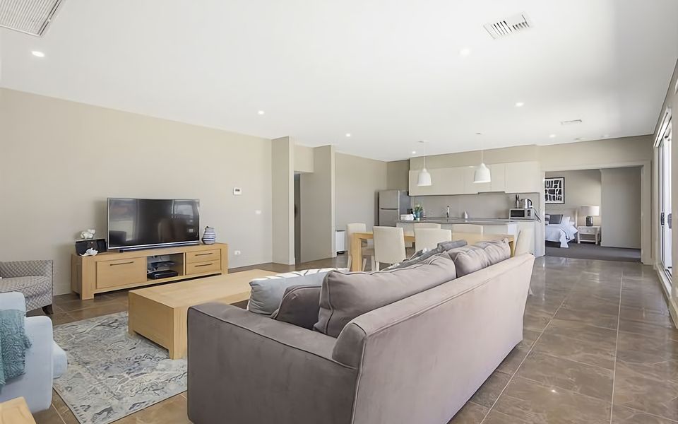 Our penthouse boasts an open plan kitchen and living room, offering a generous space for cooking, dining, and unwinding, all while taking in the breathtaking views that surround you.