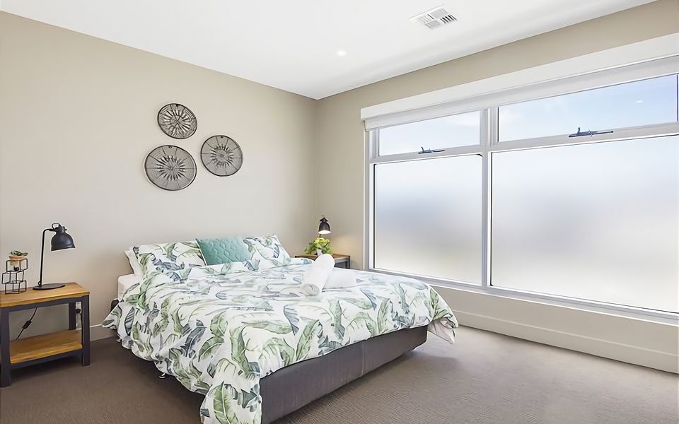 Enjoy ultimate comfort in our inviting bedroom, furnished with a spacious queen bed, offering a restful haven after a day of exploring the Peninsula.