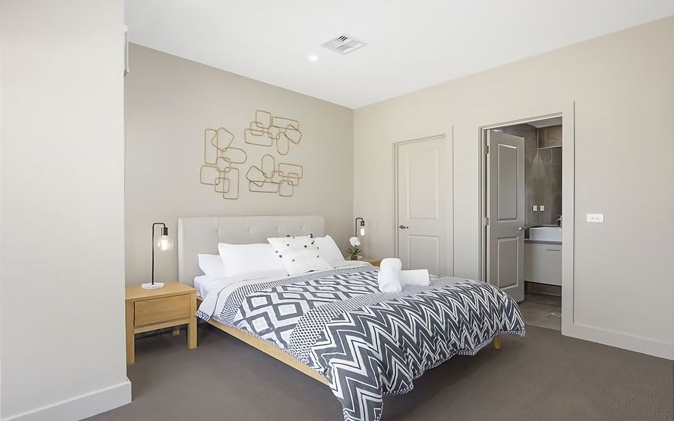 Experience a peaceful getaway in our penthouse bedroom with a queen bed and ensuite, offering a serene and stylish space to unwind and recharge.