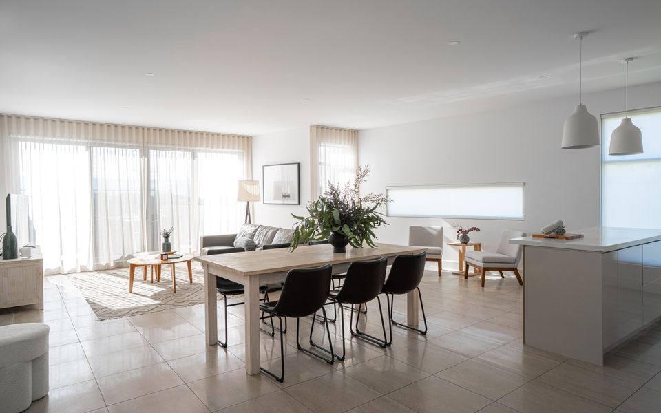 Light filled dining for shared meals, with seating for six.