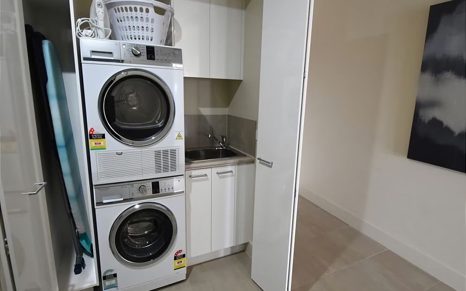 European Laundry with front load washing machine and dryer.