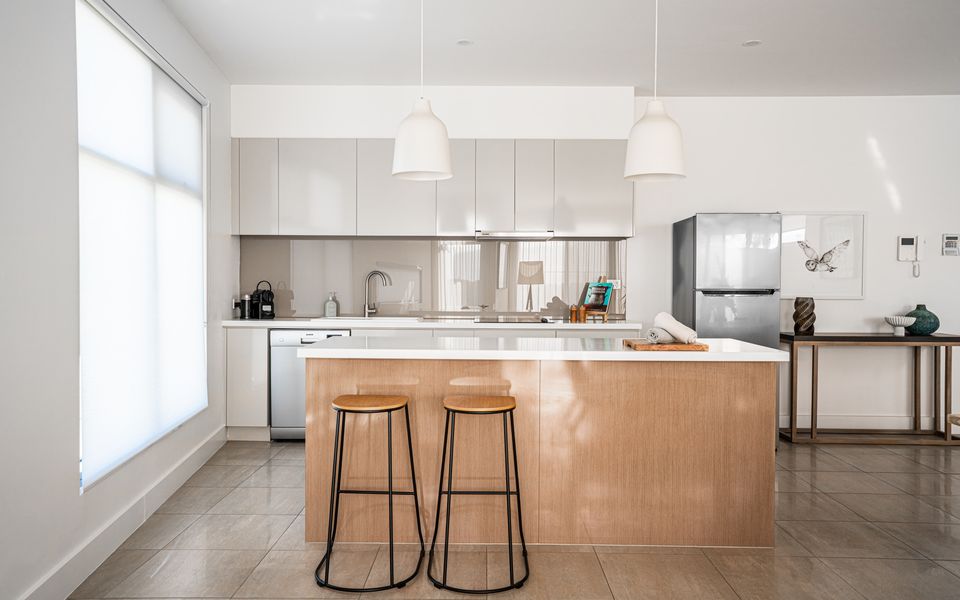 Modern kitchen with all essentials and bench seating for two
