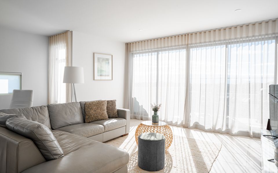 Light filled living area with smart TV