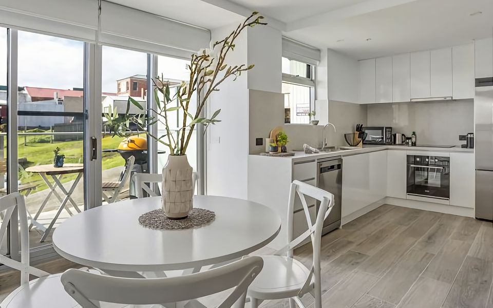 Enjoy the convenience of a modern kitchen and a welcoming dining space for memorable meals.