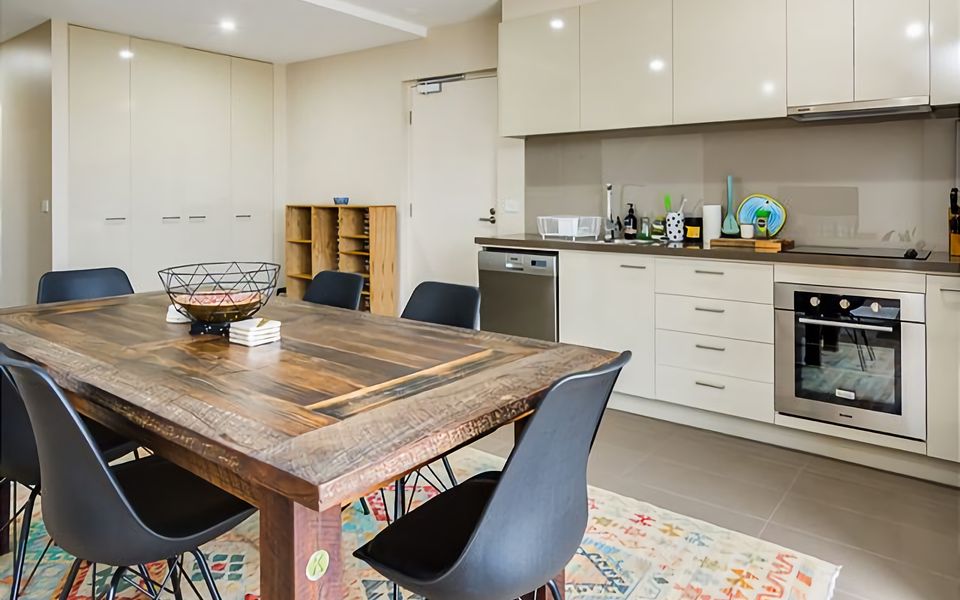 Enjoy a delightful meal in our stylish dining area, bathed in natural light from the large windows.