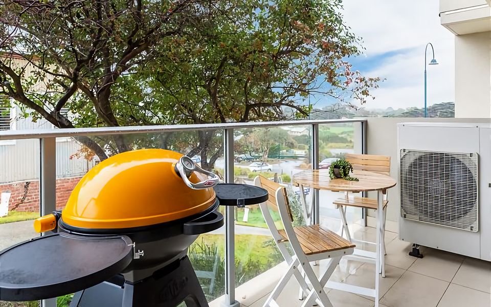 Relax and unwind on your private balcony with BBQ and outdoor setting.