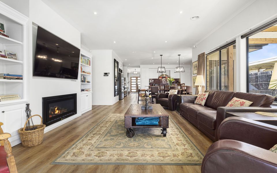 Open plan living area with smart TV and gas fire
