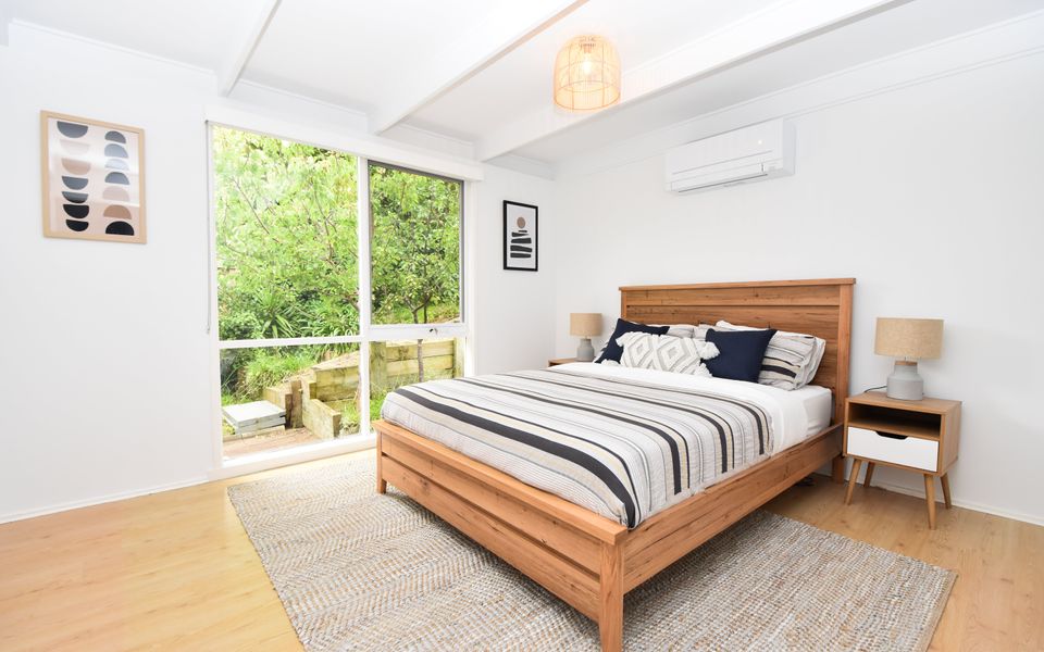 Master Bedroom: Queen Bed, reverse-cycle AC, and built-in-robe.