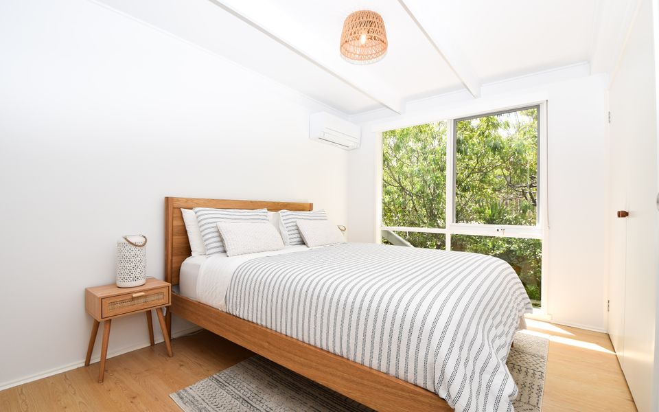 2nd Bedroom: Queen Bed, reverse-cycle AC, and built-in-robe.