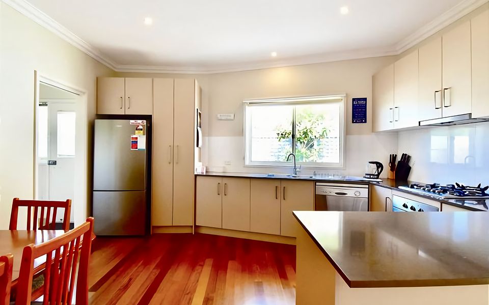 Light filled, fully equipped kitchen.