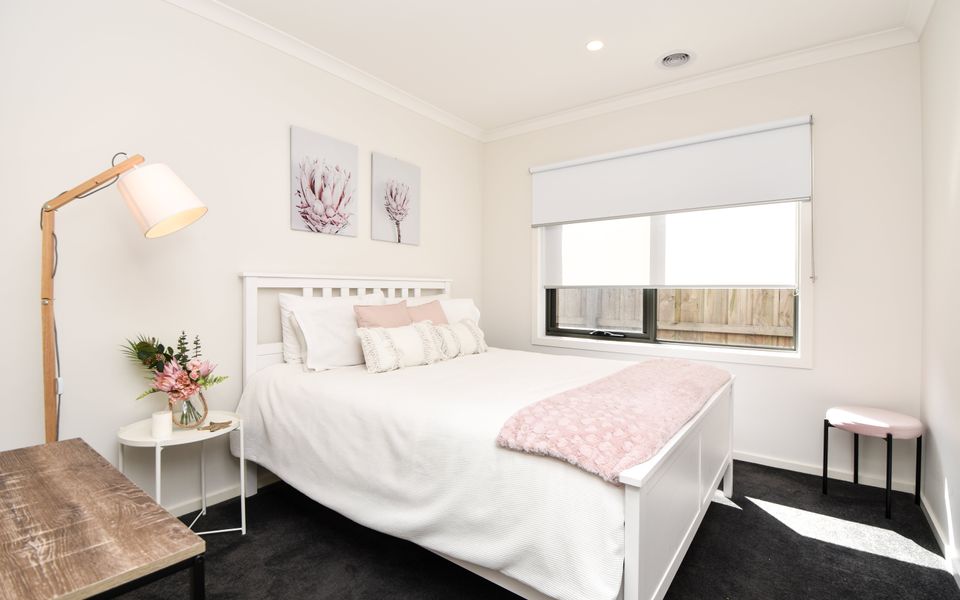 Indulge in a peaceful night's sleep in our elegant bedroom, complete with a luxurious queen bed.