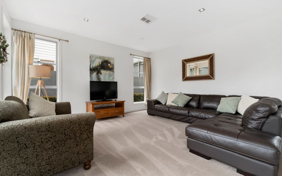 Rumpus room with plenty of seating located on the ground floor