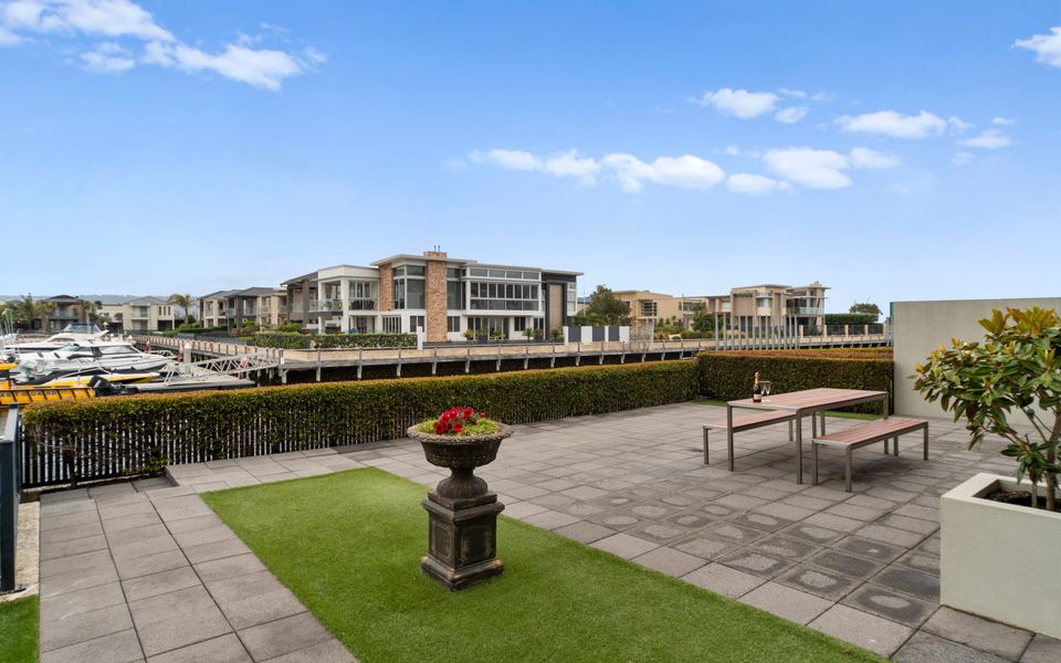 Relax in the courtyard which has direct private access to the boardwalk