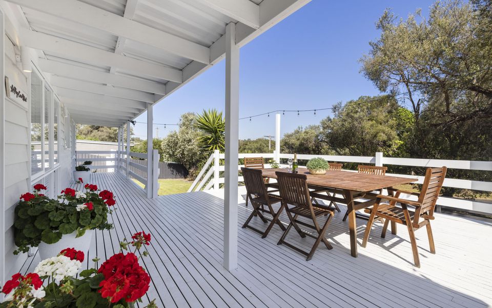 Decked alfresco area, overlooking the front garden, ideal for relaxing.